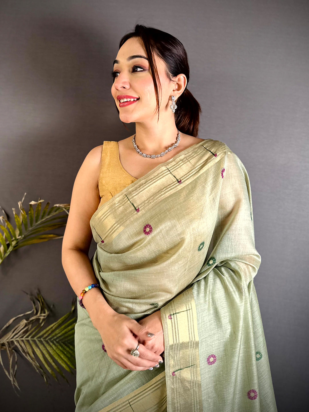 Aura Green Minakari Butti Linen Saree
