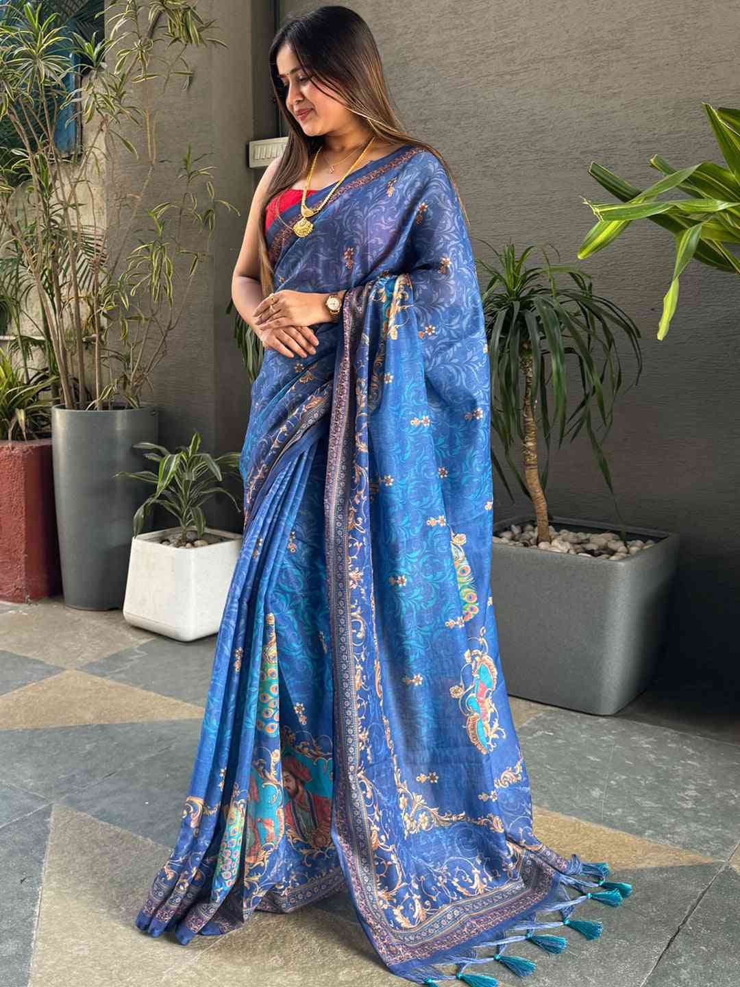 Traditional blue linen saree featuring digital prints