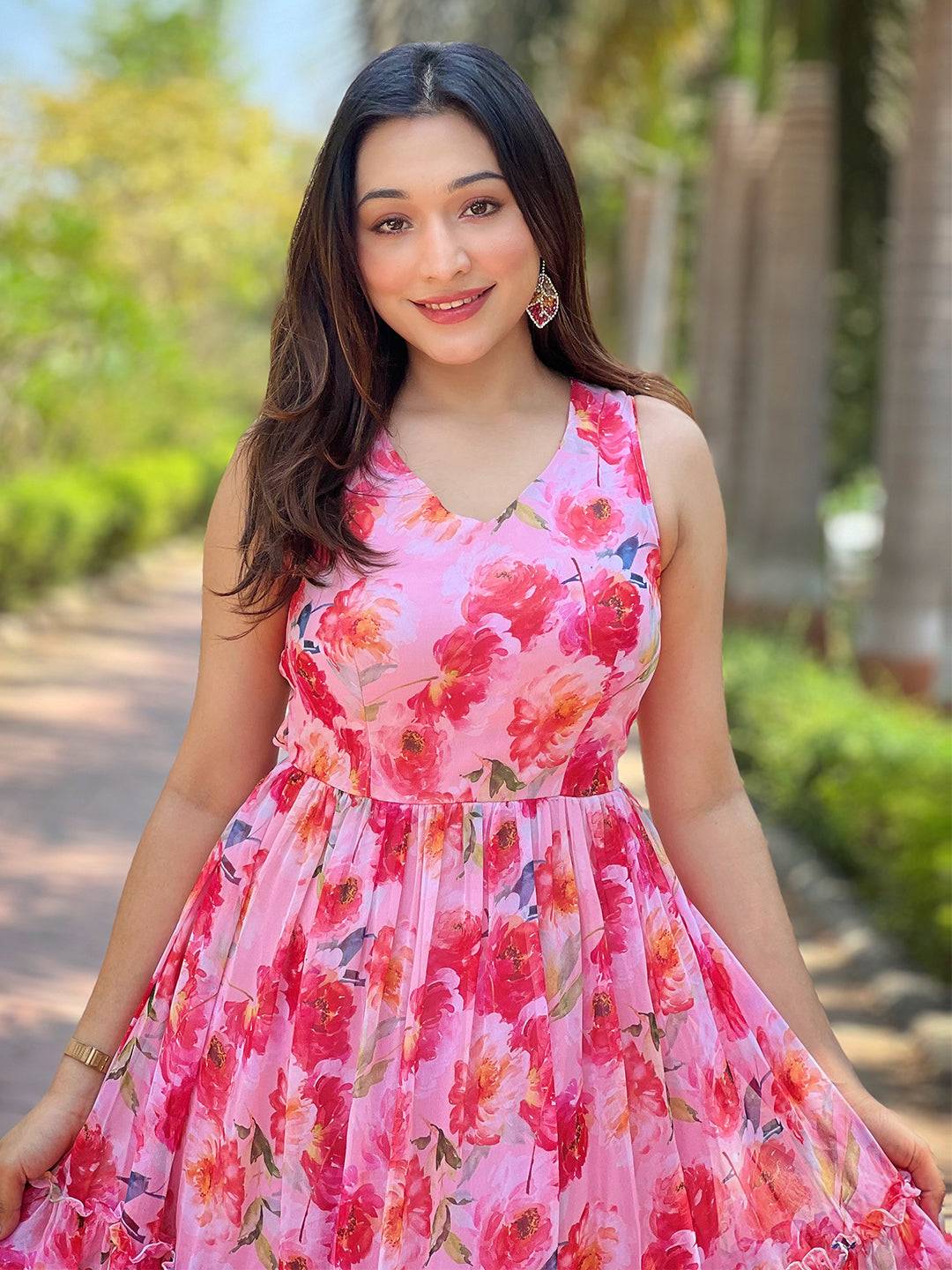 Close-up of neon pink floral print dress