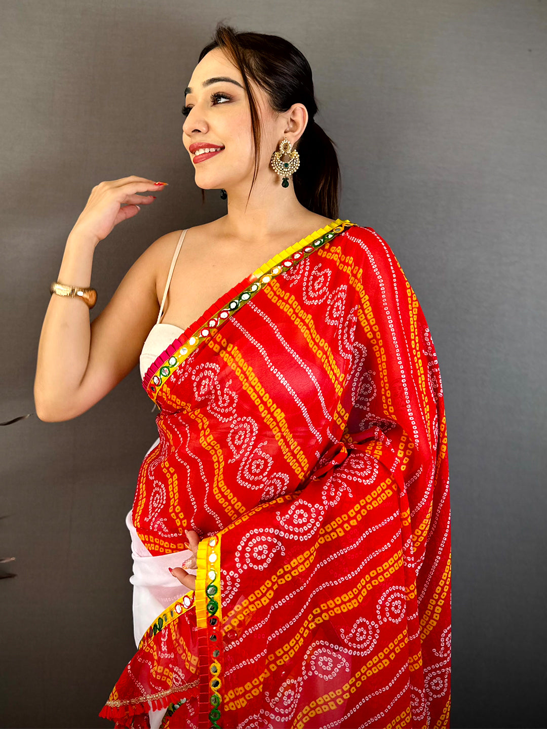 Radiant Bandhej Print Ruffle Georgette Saree