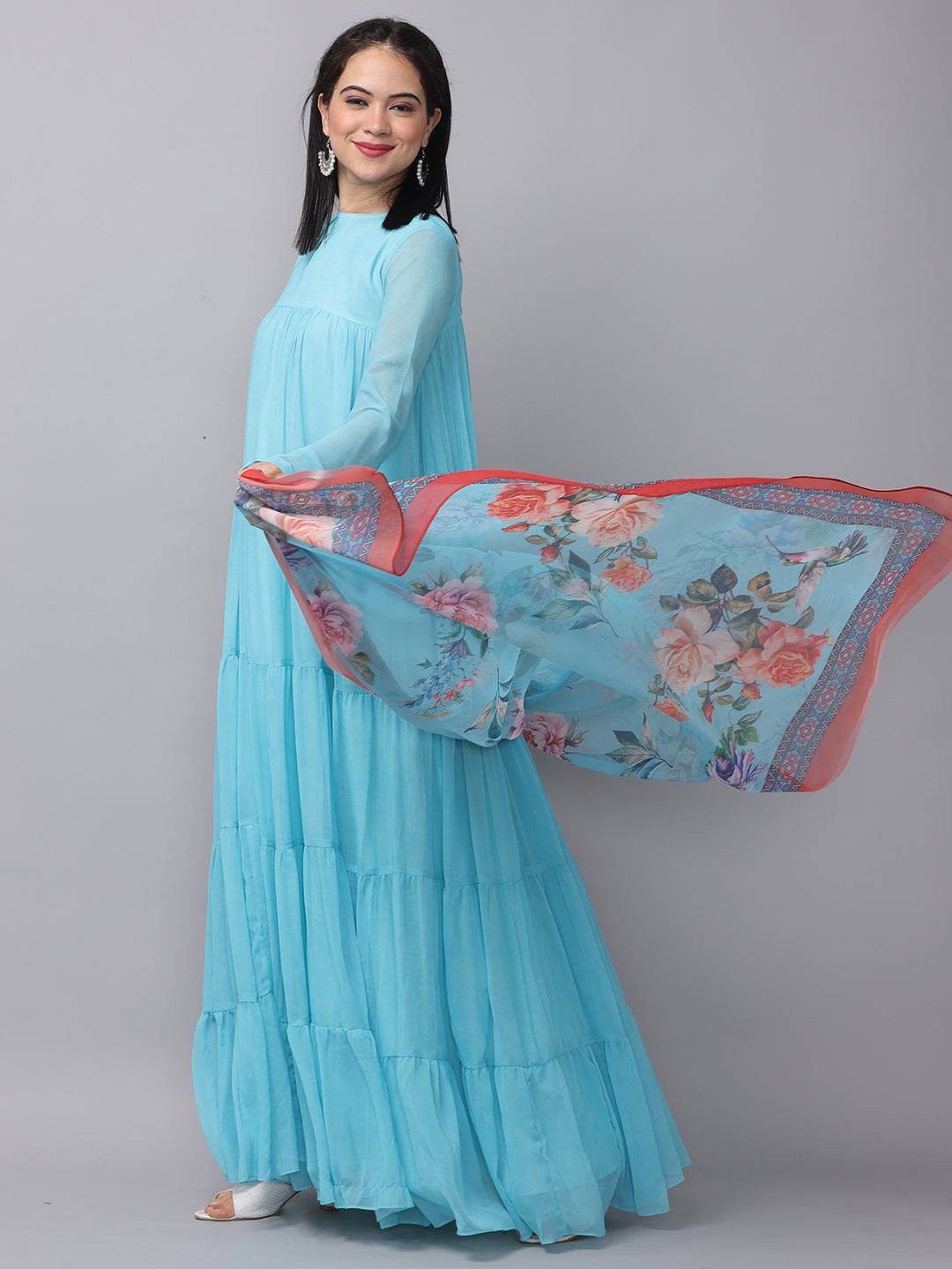 Flowing powder blue dress with floral dupatta, side pose
