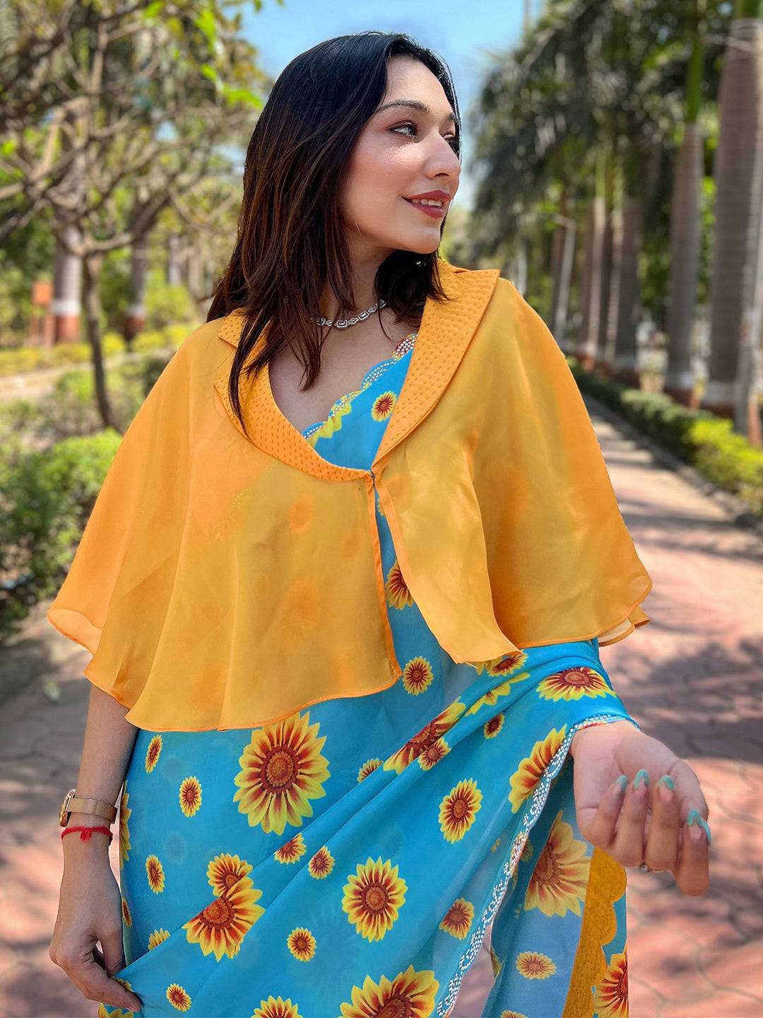 Blue sunflower saree with yellow cape and Swarovski border