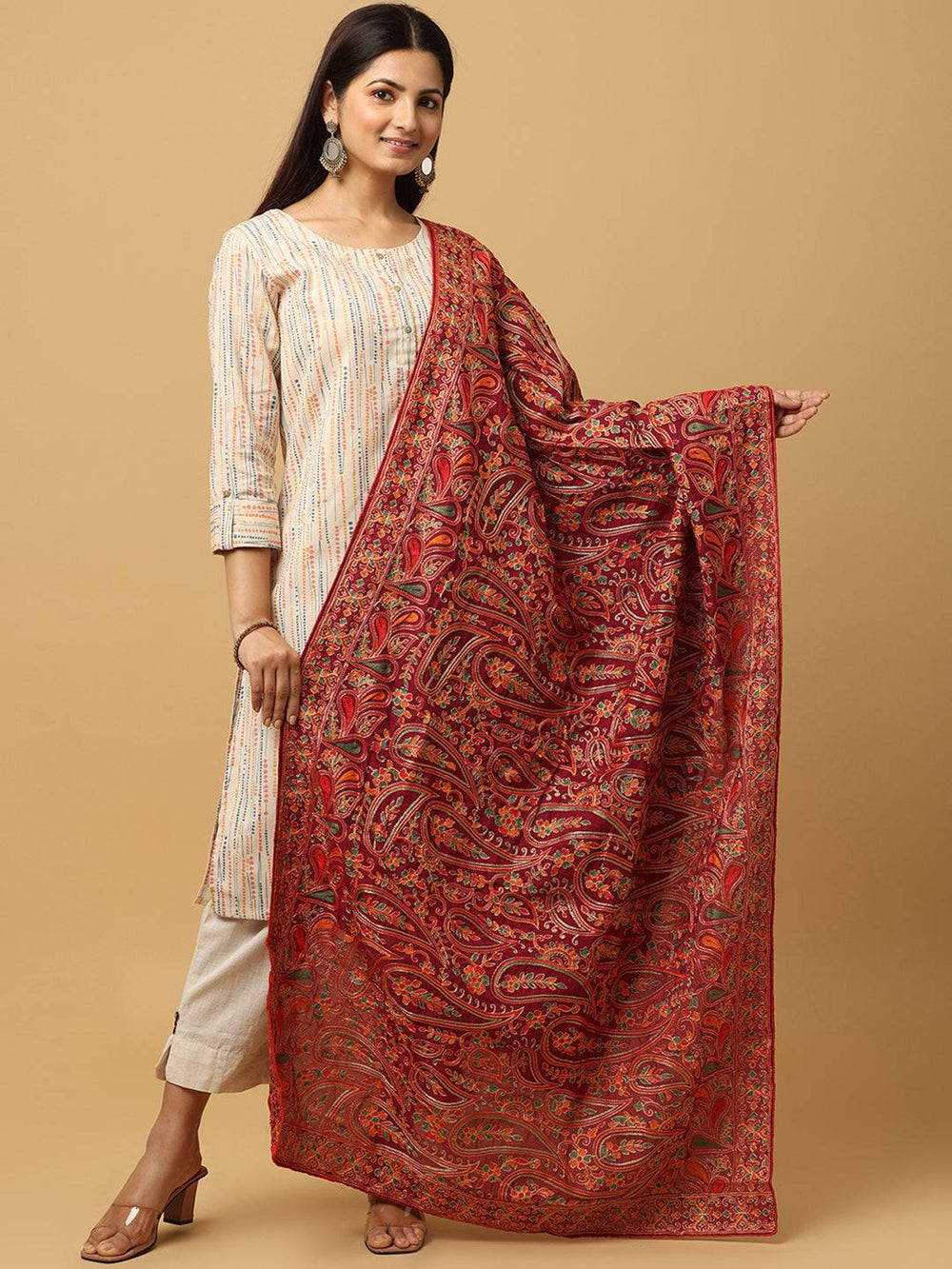 Model wearing red embroidered poly chiffon pashmina dupatta