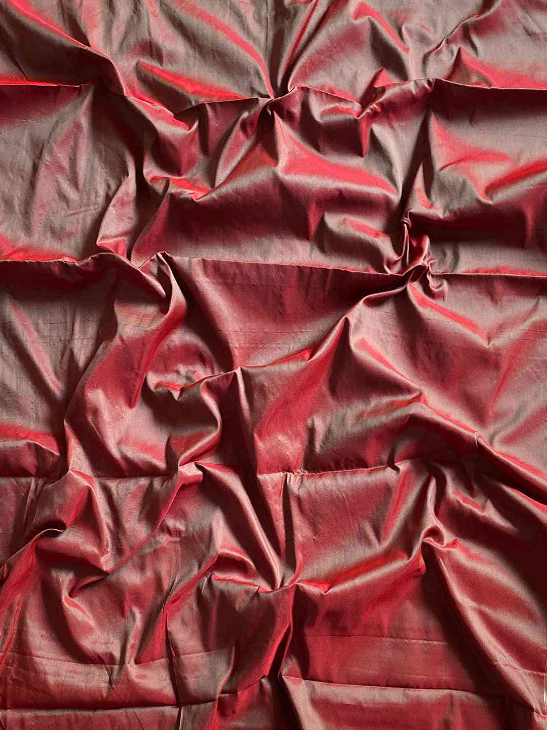 Fabric texture of pink Paithani saree with zari weaving