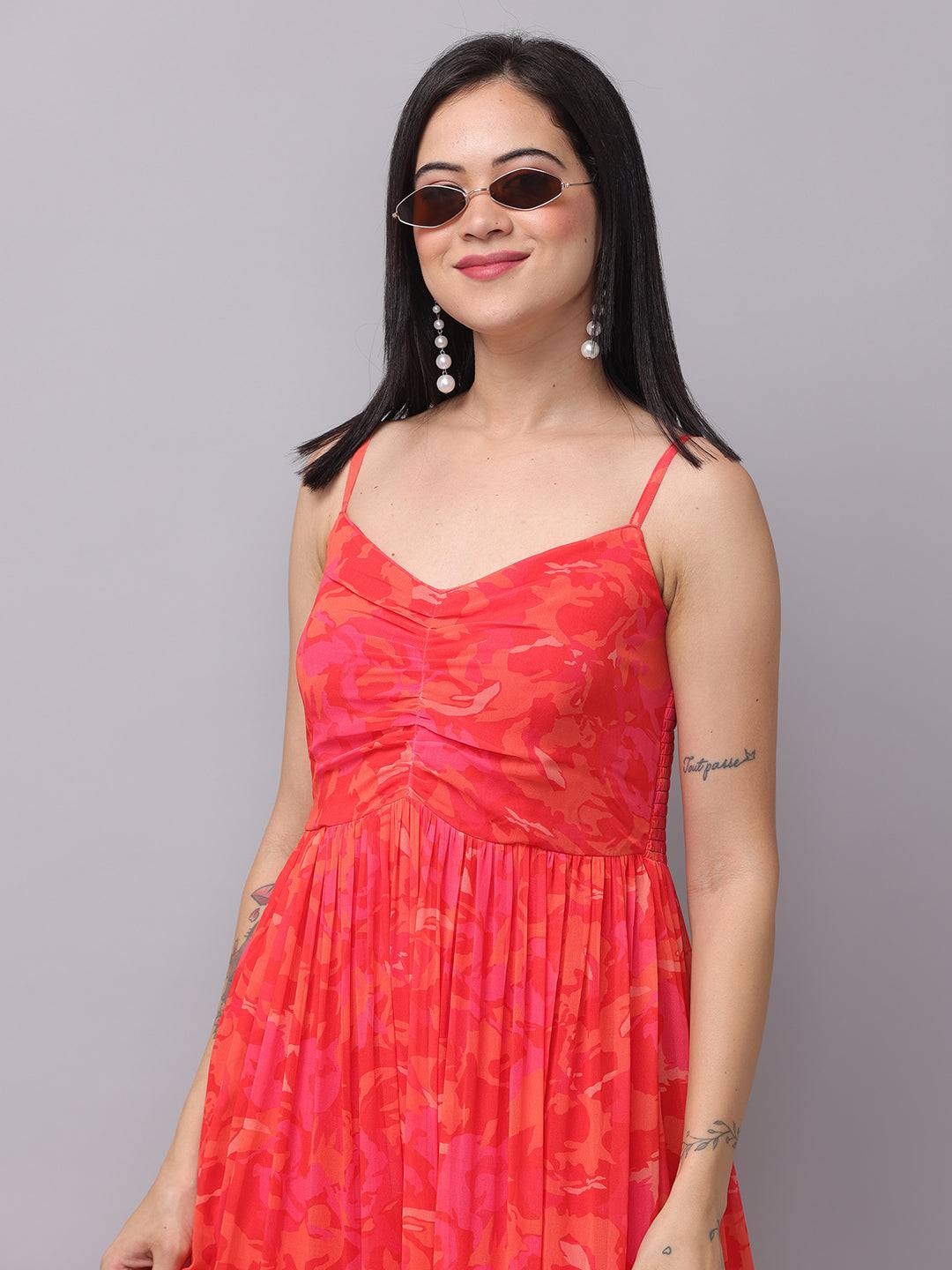 Radiant red floral ruched maxi dress close-up