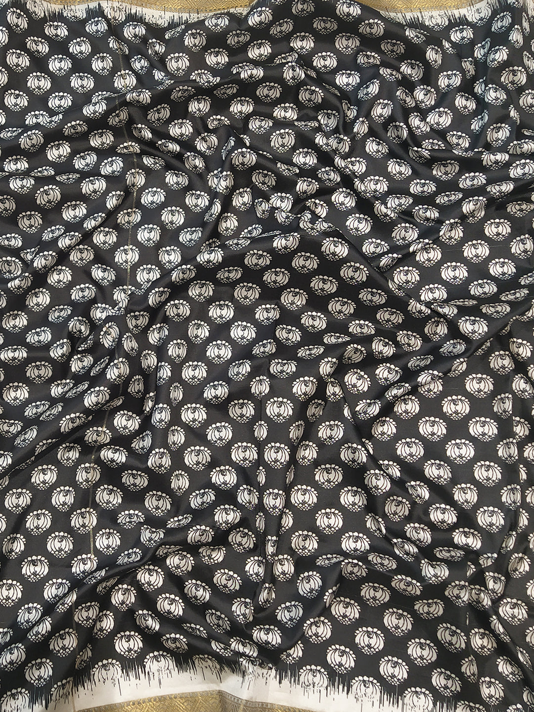 Black Kalamkari saree fabric with lotus block print design