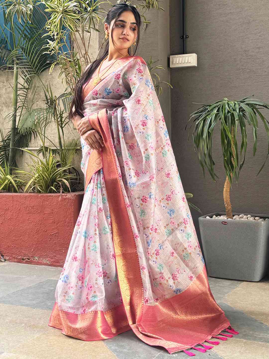 Elegant light pink Kota silk saree with floral design