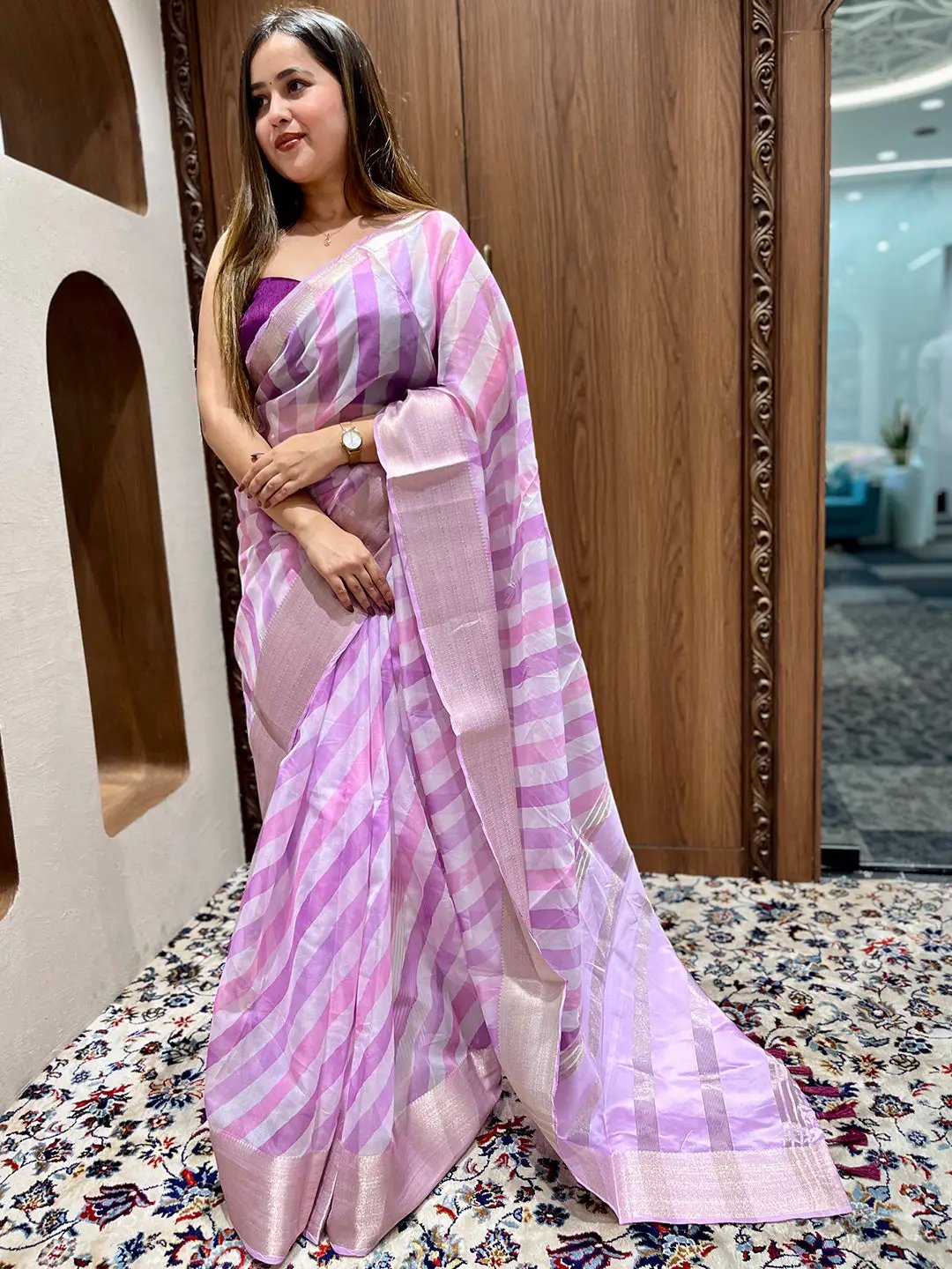 Party wear organza saree in pink leheriya design