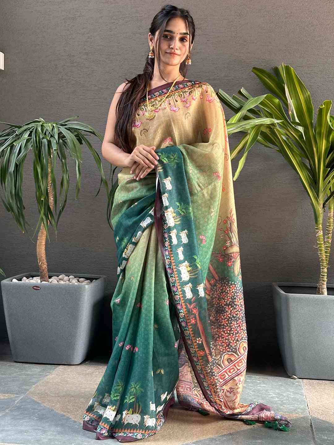 Model showcasing Soft Linen Ombre Pichwai Green Saree