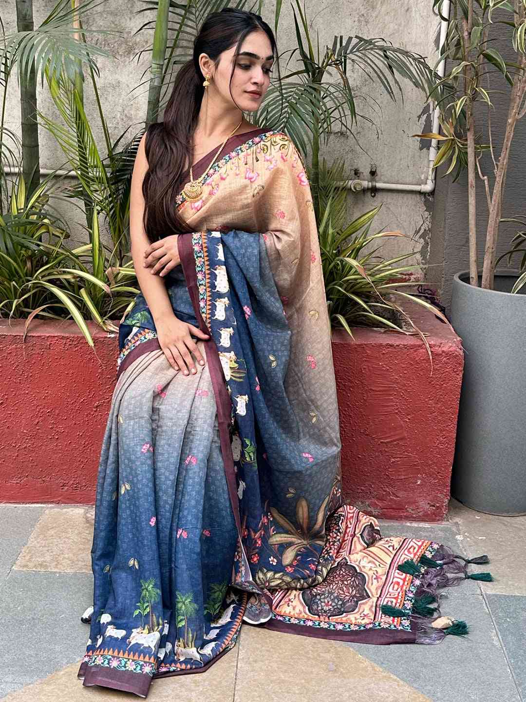 Soft linen blue Pichwai saree with vibrant prints