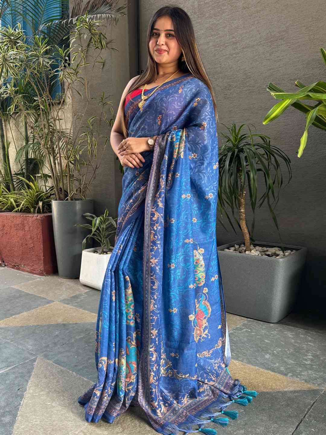 Stylish blue saree with digital print and ornate border