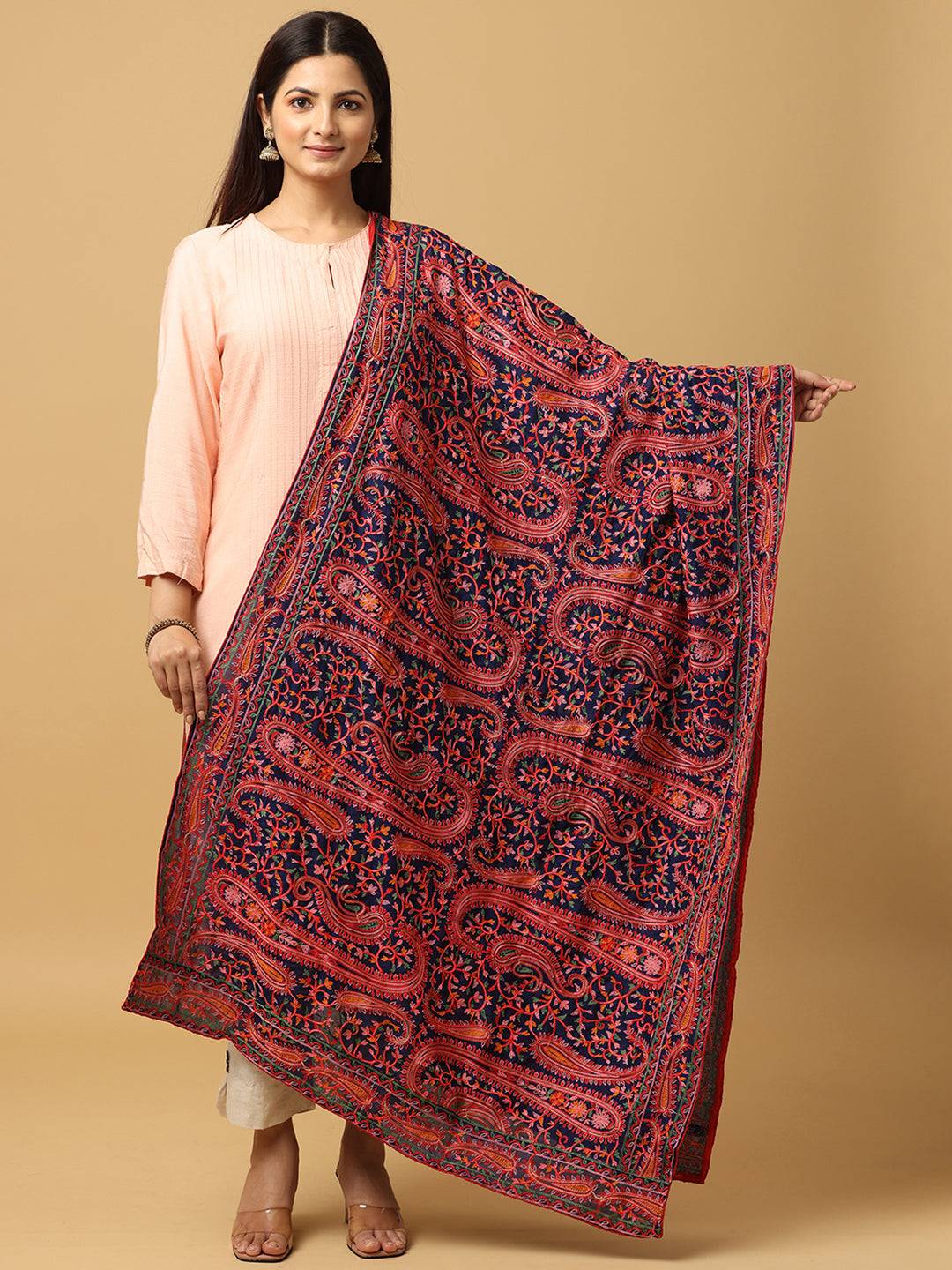 Elegant navy and red embroidered dupatta draped over shoulder.