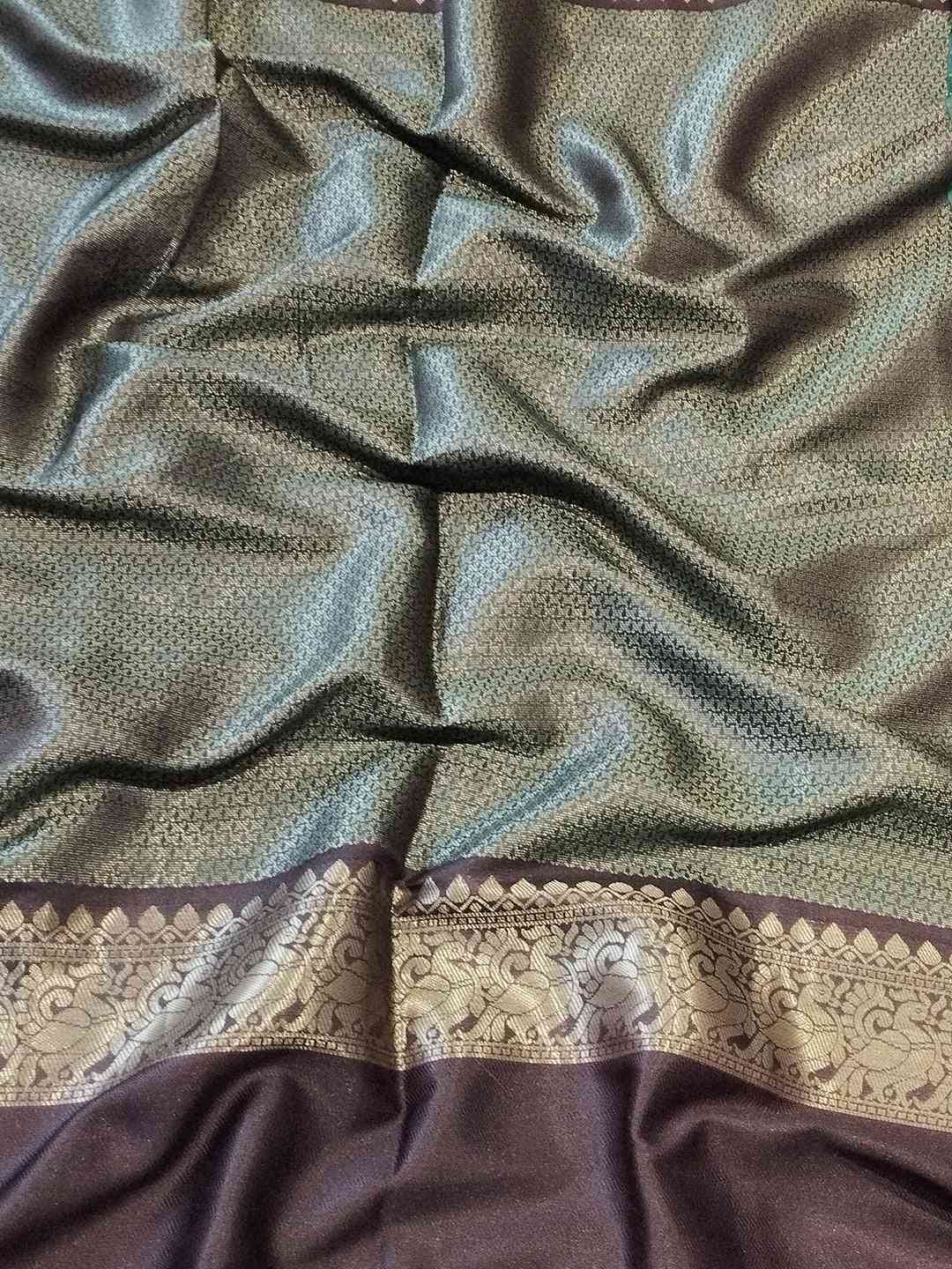 Green Banarasi silk saree fabric with detailed double border design