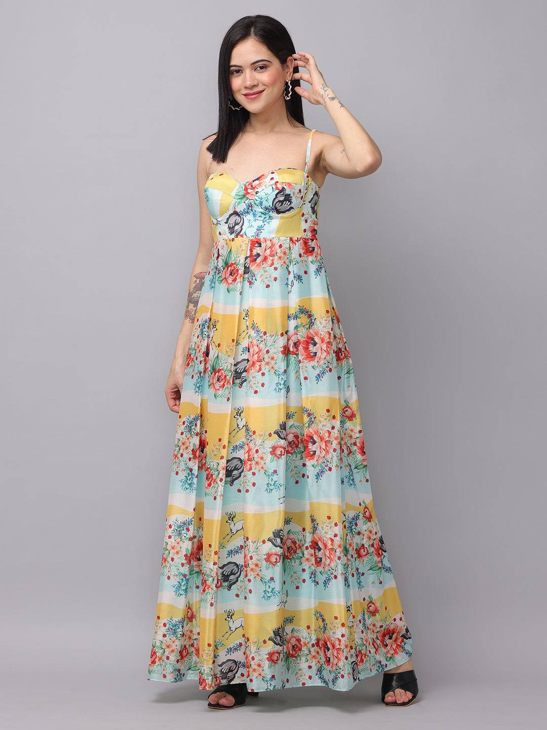 Chiffon print sleeveless dress with floral design, casual pose