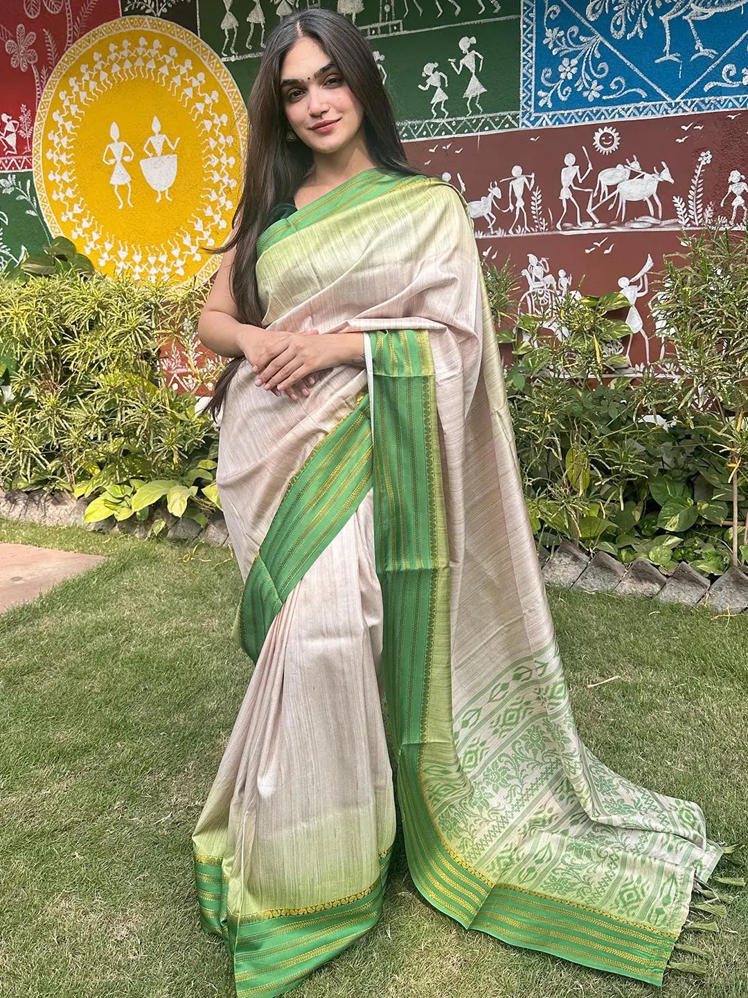 Stylish Ghicha saree adorned with green Ikkat motifs and paisley