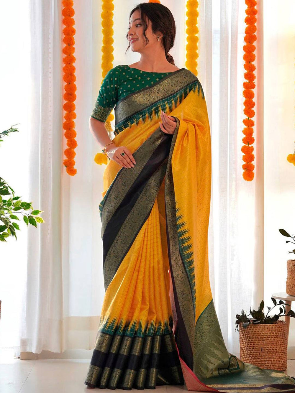 Full view of yellow Banarasi Gadwal saree with detailed zari work.