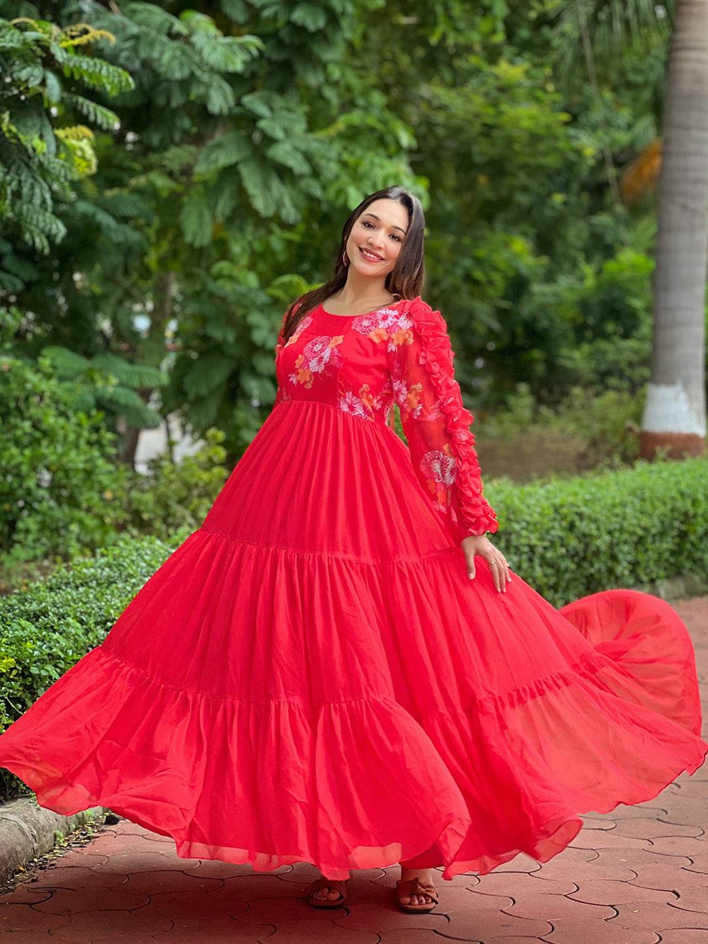 Elegant Radiant Ruby Dress flowing in outdoor scene