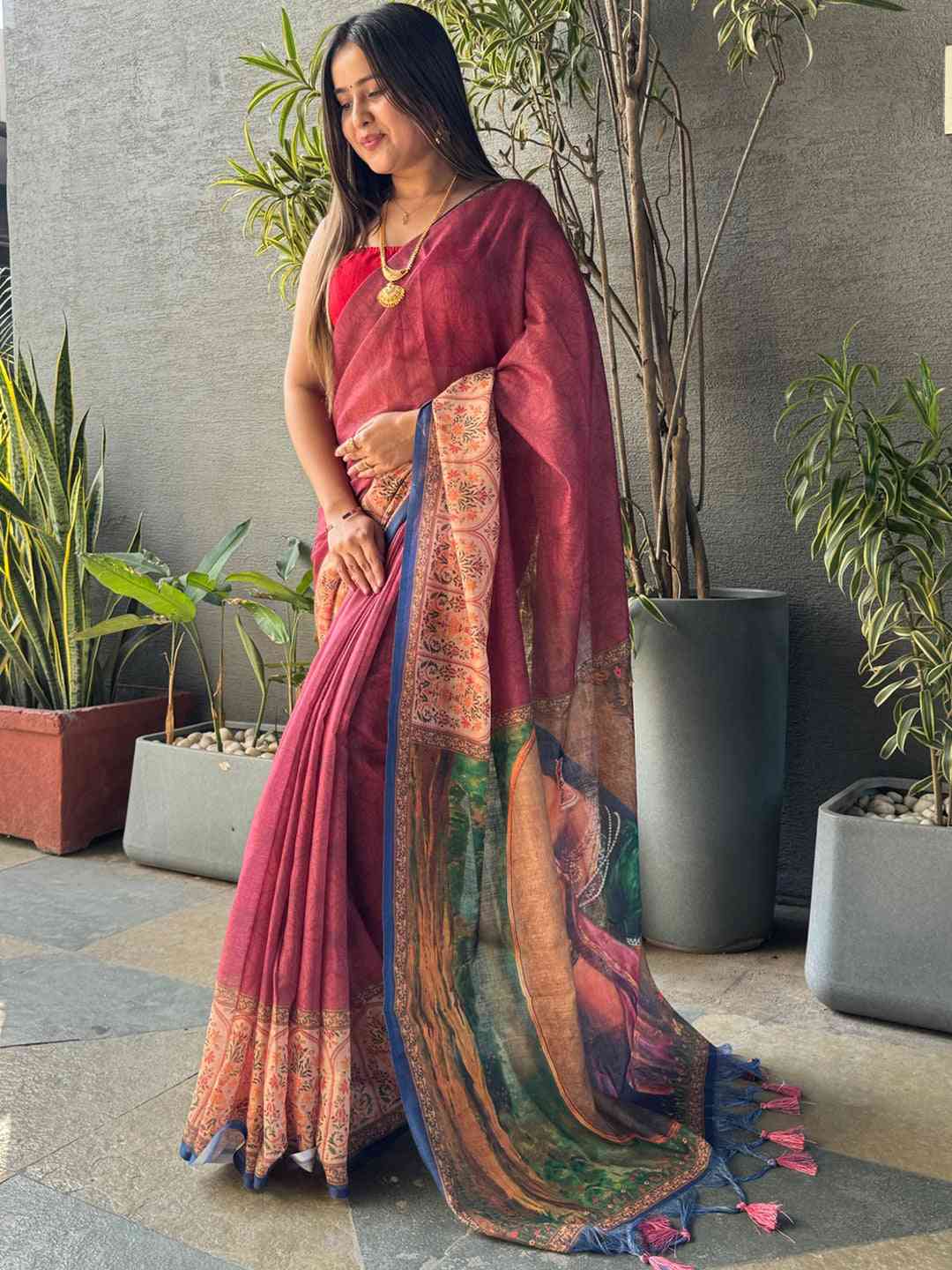Elegant burgundy Ikkat saree with kalamkari print