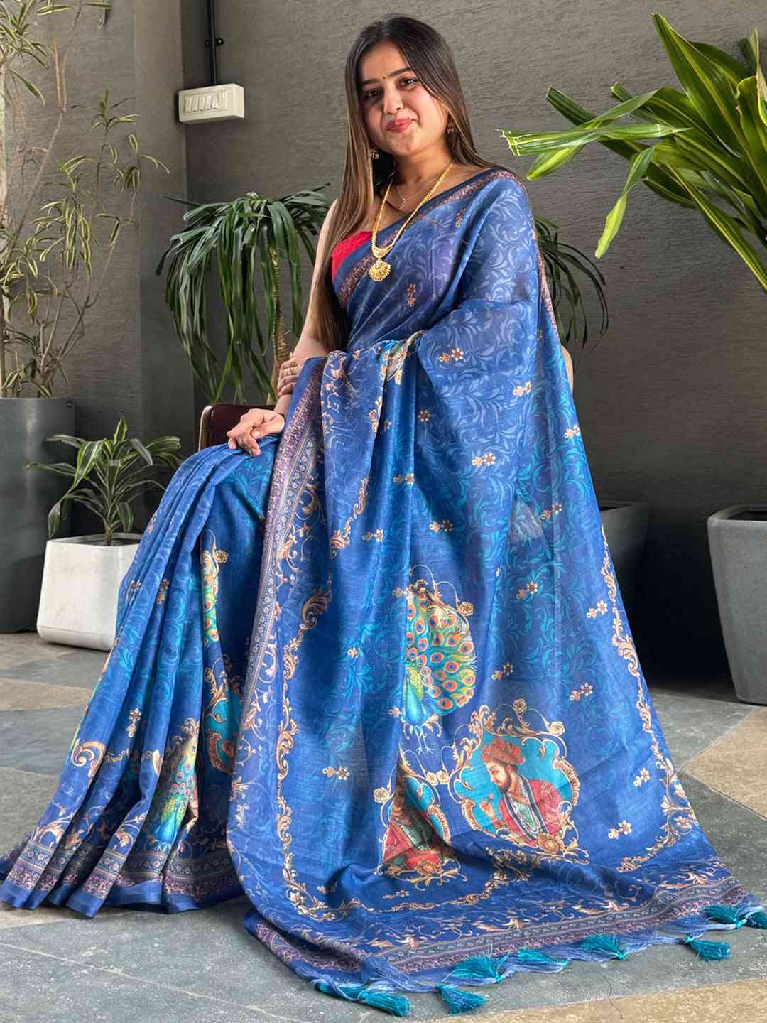Blue linen saree with digital print and majestic border