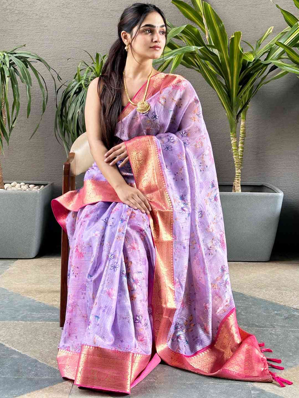 Chic purple Kota silk saree with floral pattern and gold border