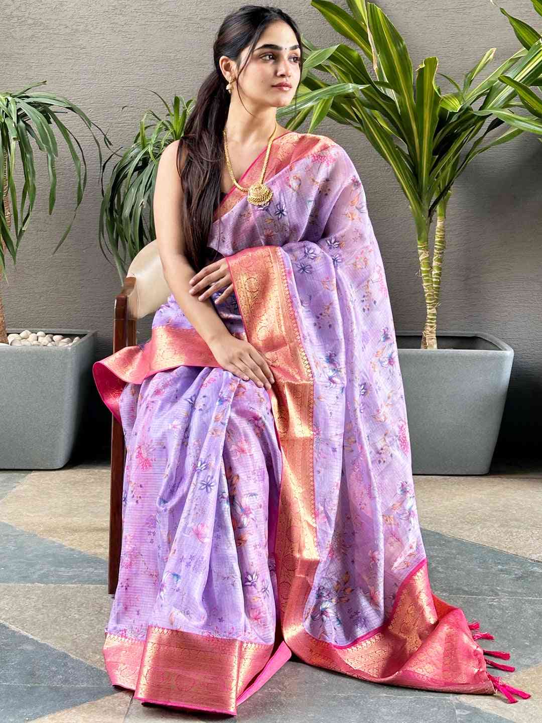 Chic purple Kota silk saree with floral pattern and gold border