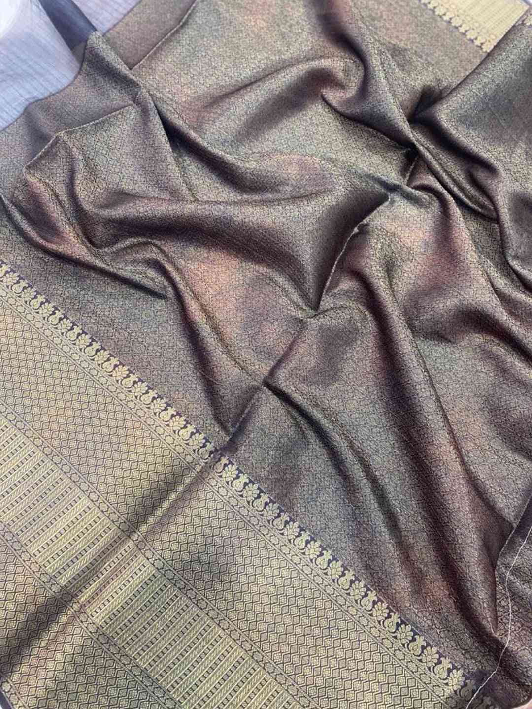 Close-up of Kalamkari Printed Saree fabric with gold border