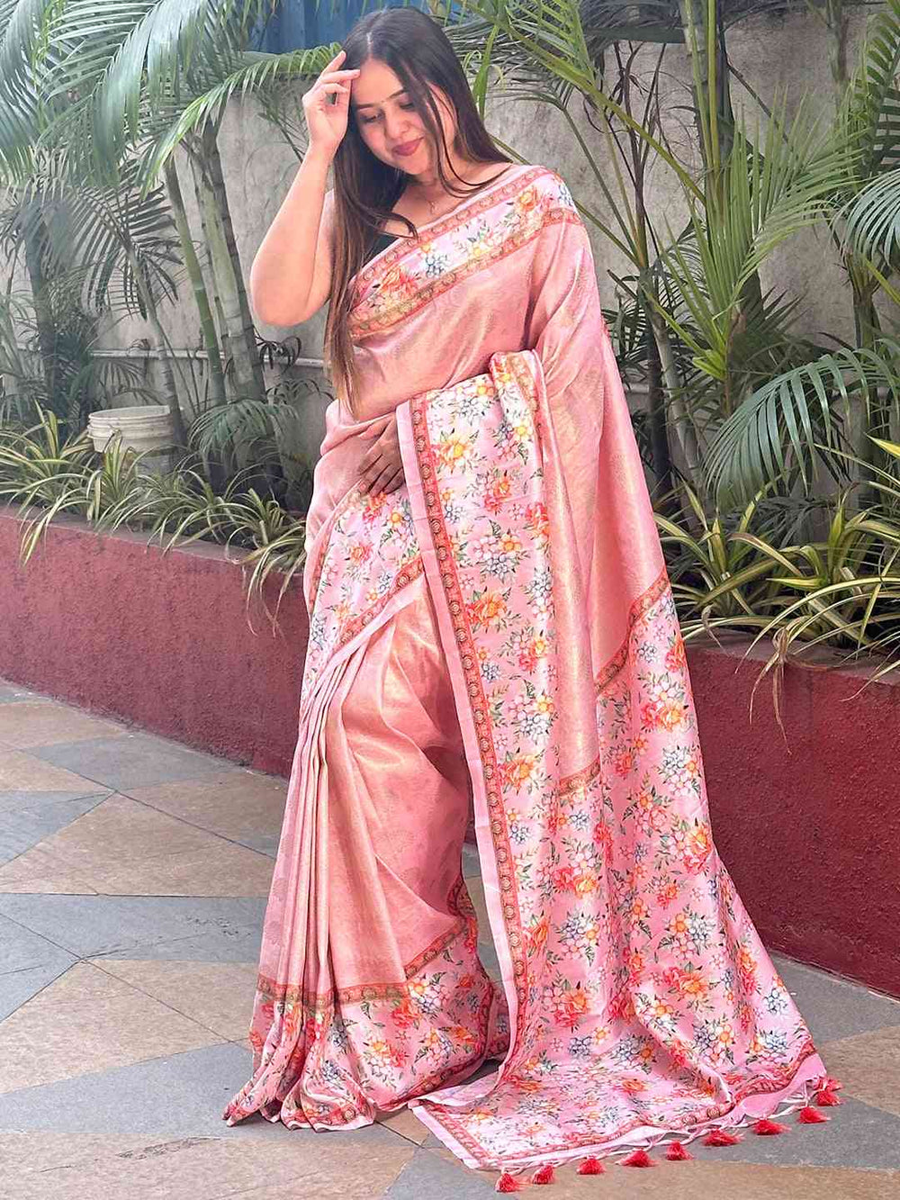 Stylish pink Kanjivaram saree with intricate floral design