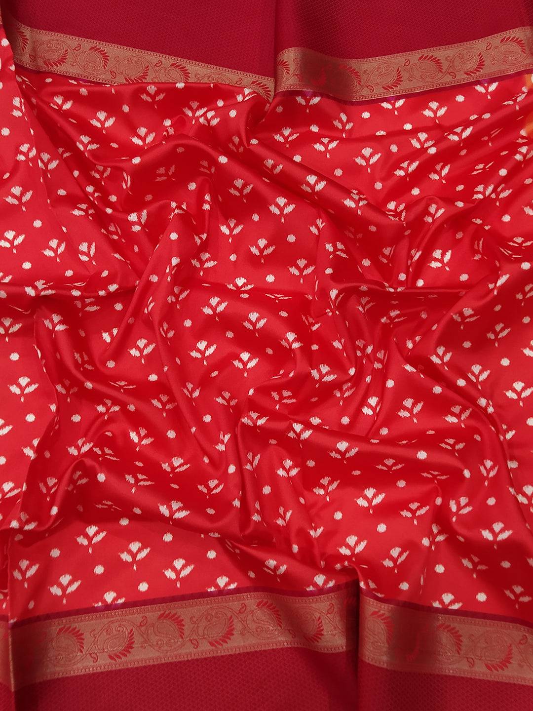 Red soft silk saree with intricate Gadwal border design