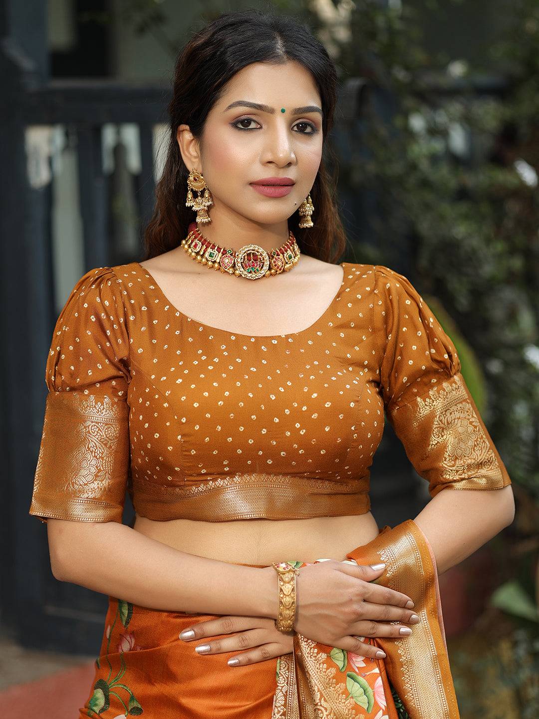 Viscose Dola Silk Orange Saree with Floral and Mughal Print