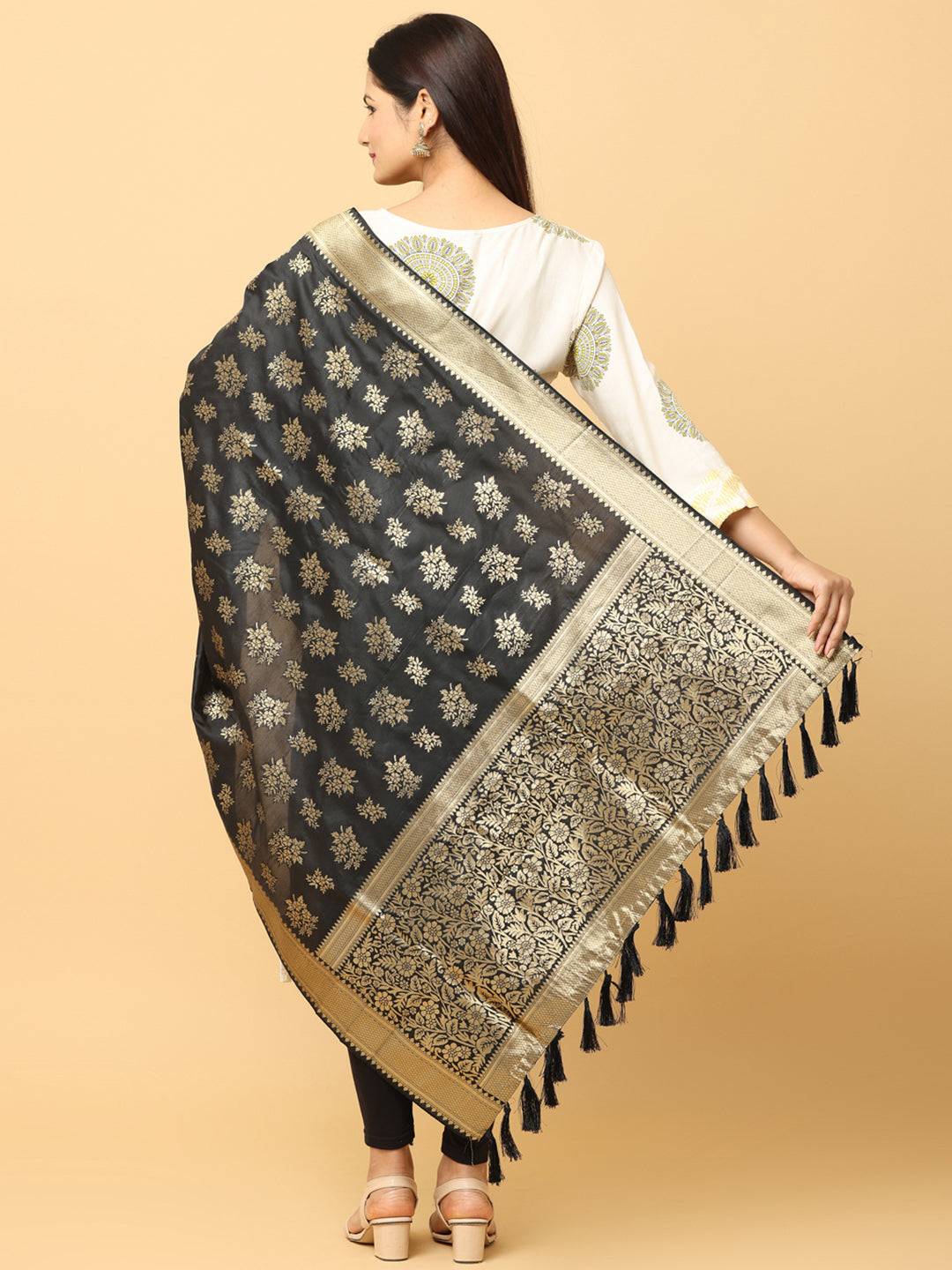 Back view of black silk blend dupatta with intricate patterns.