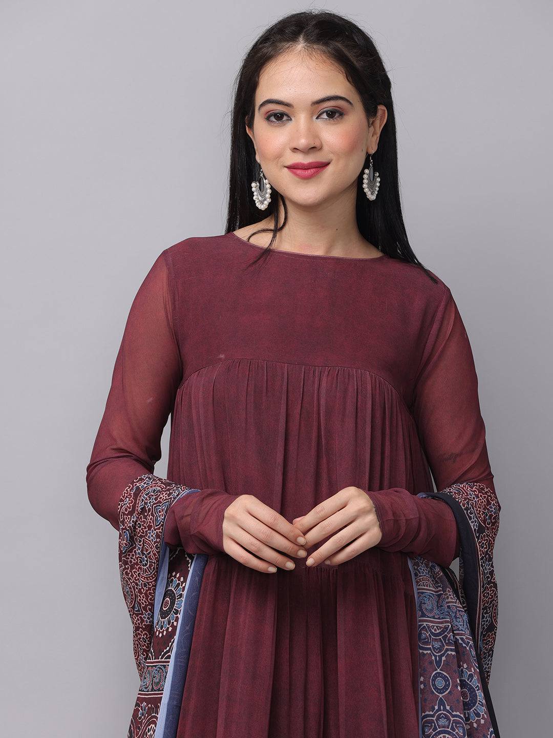 Close-up of mulberry dress with floral dupatta