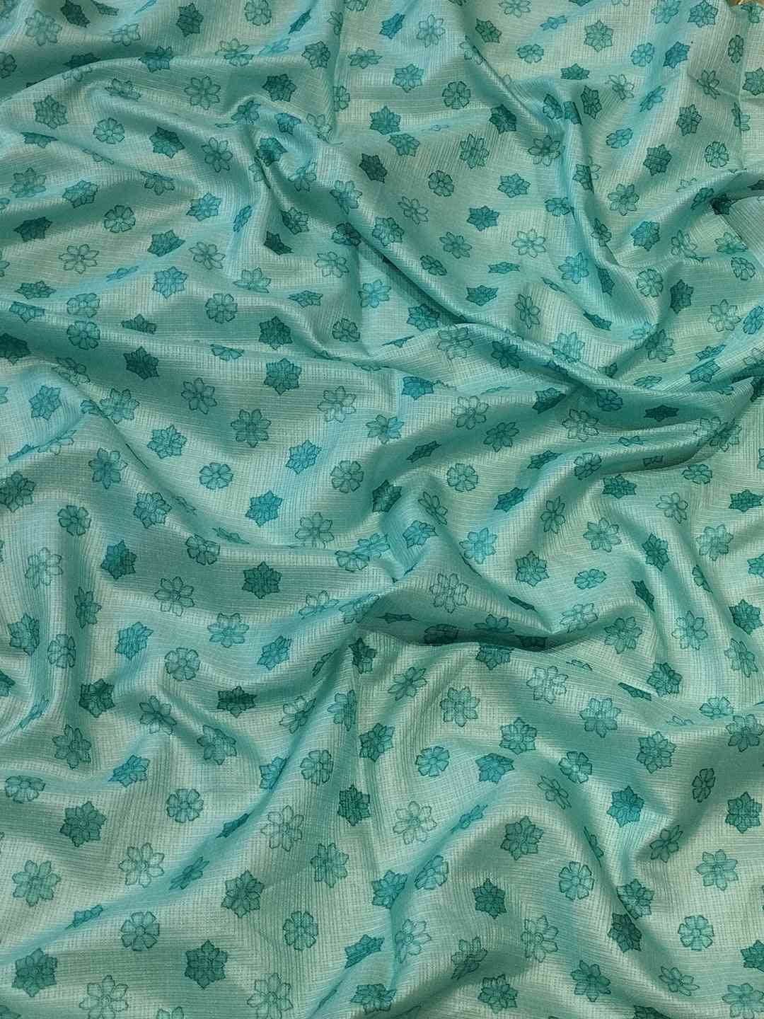 Fabric detail of Pink Kota Saree with floral motifs