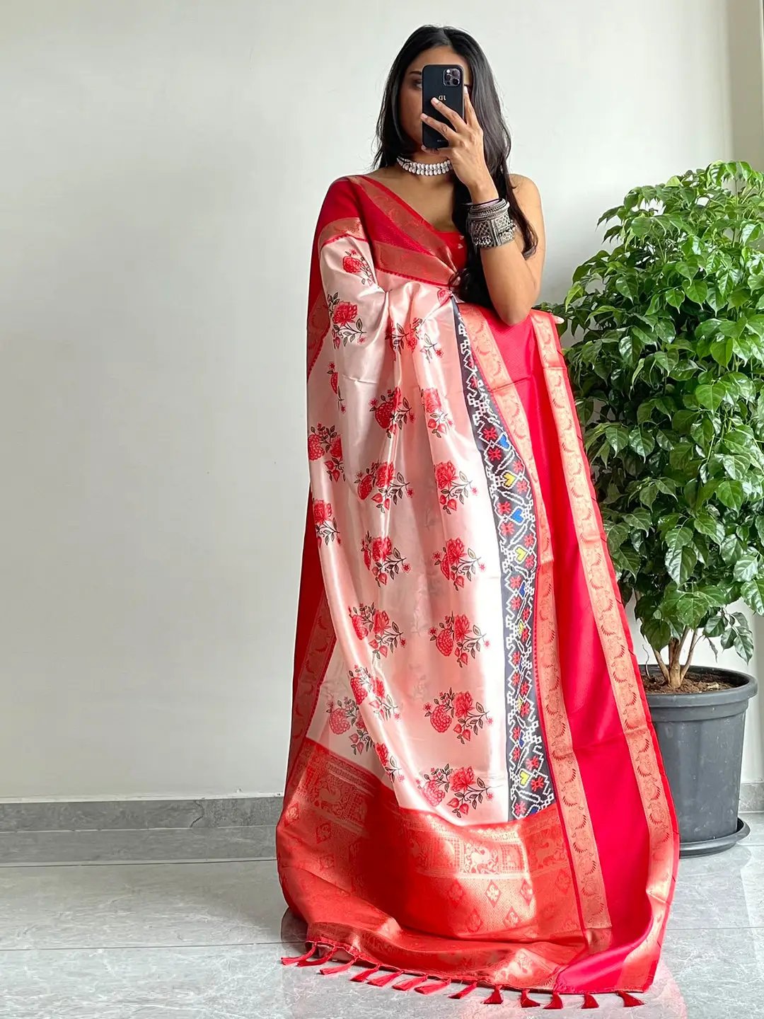 Beautiful soft silk saree with red Gadwal border and floral Pochampally print
