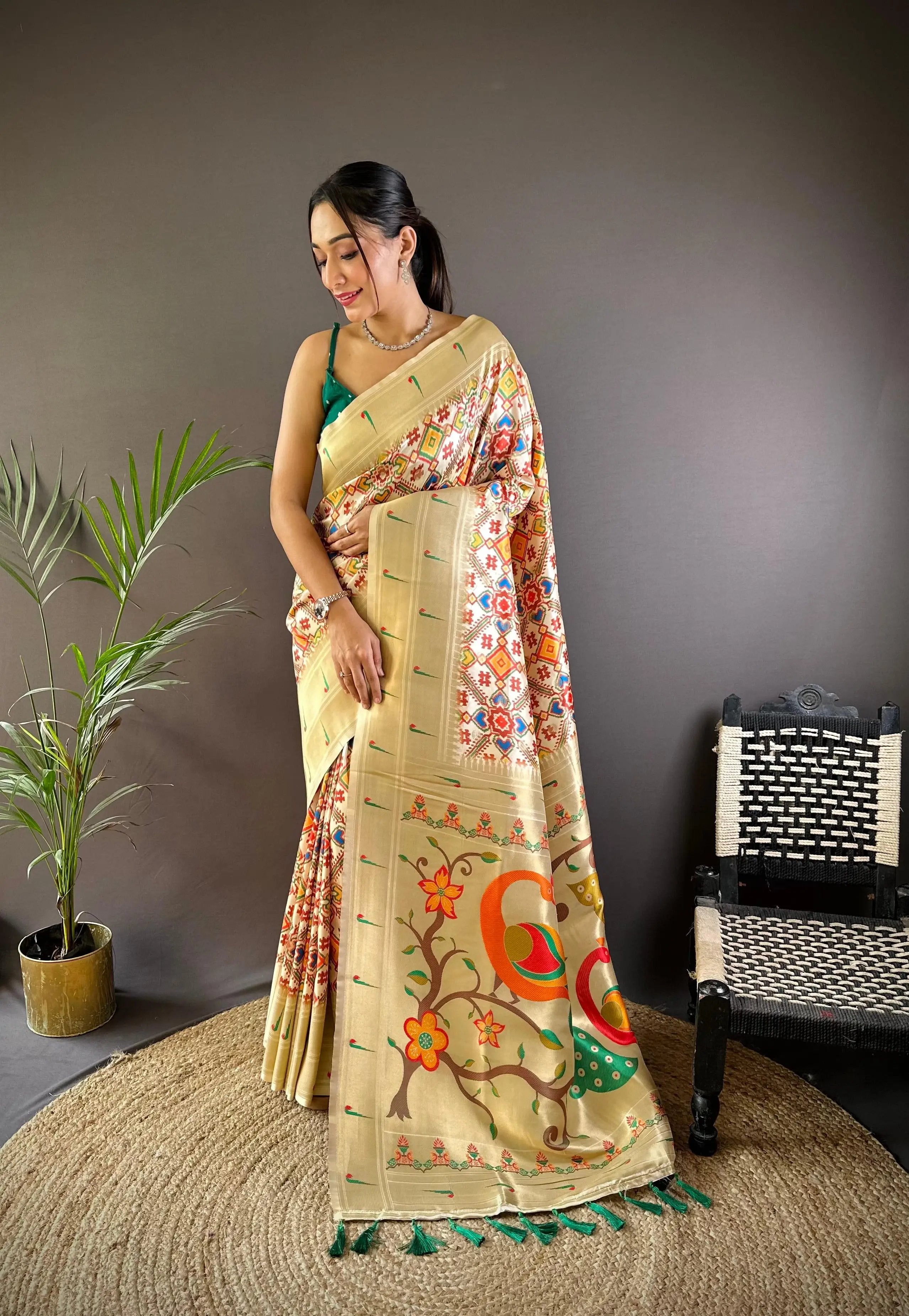 Beautiful Patola Print Paithani Silk Saree with floral accents