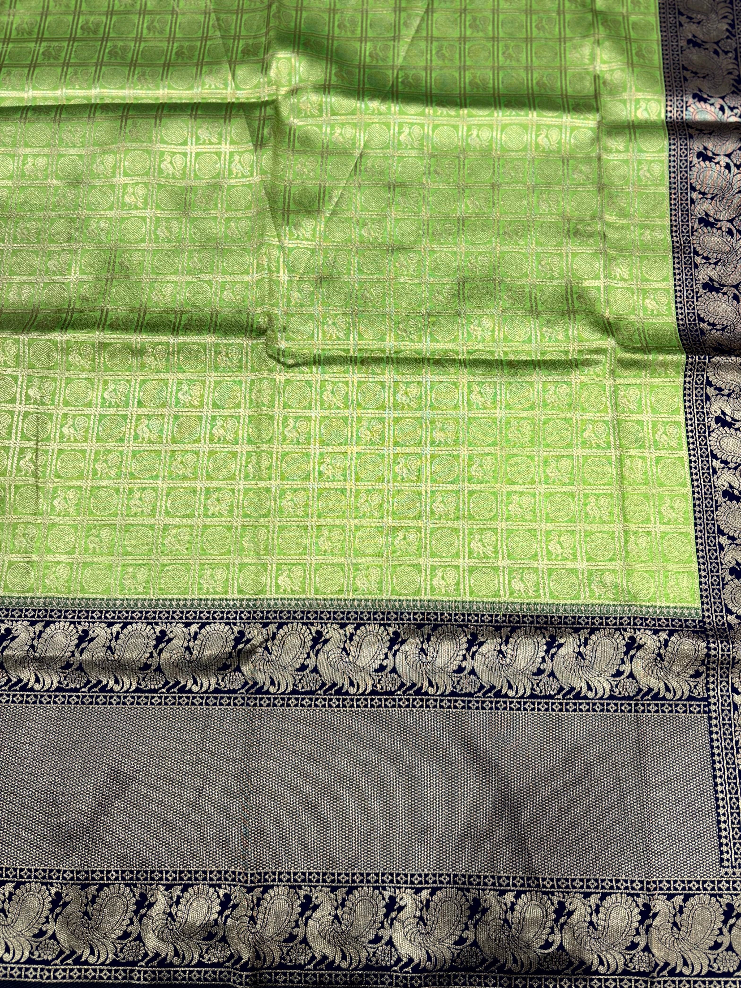 Green Silver Zari Butta Kanjivaram Silk Saree