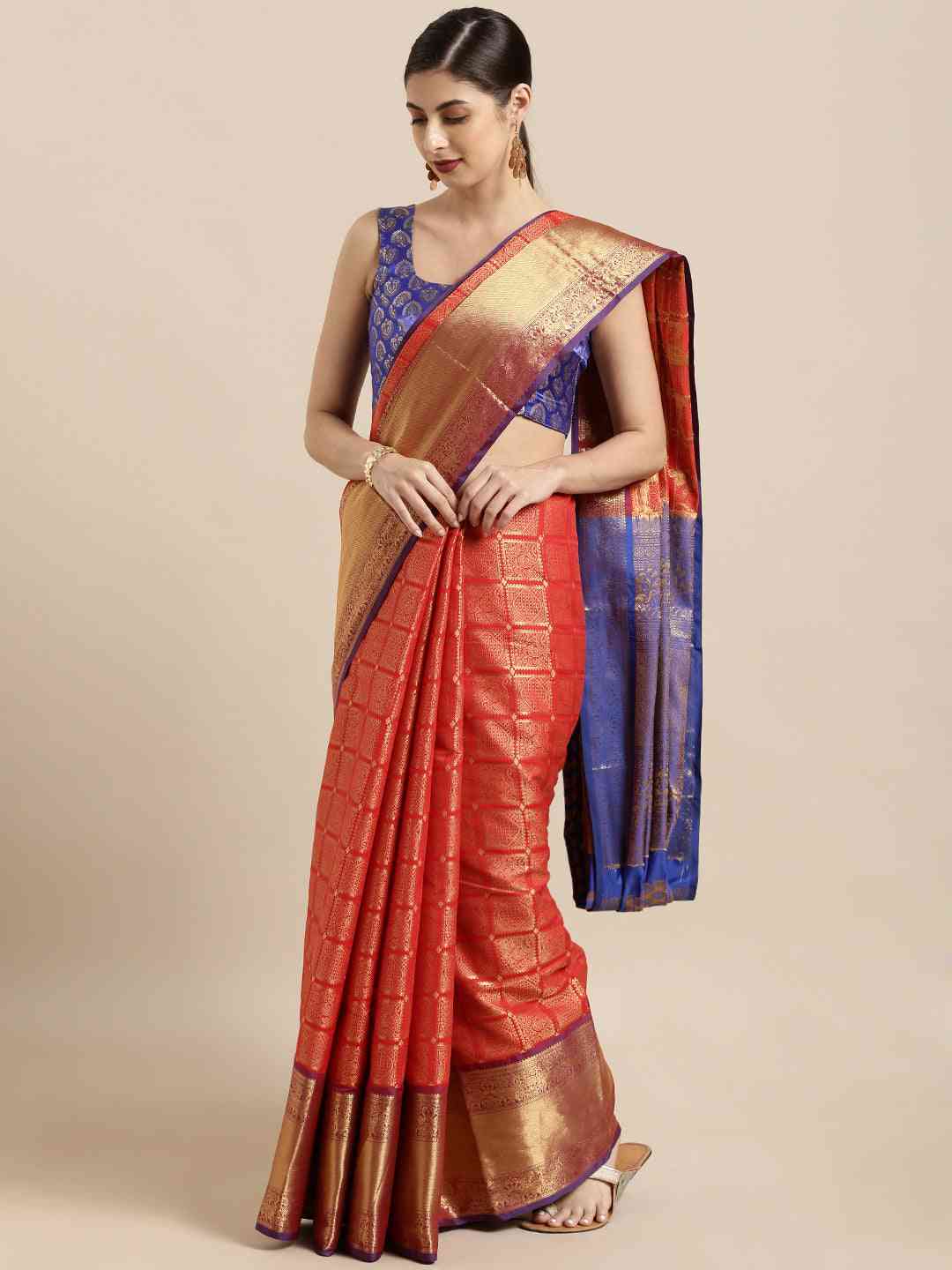 Model wearing red Kanjivaram silk saree with checked print
