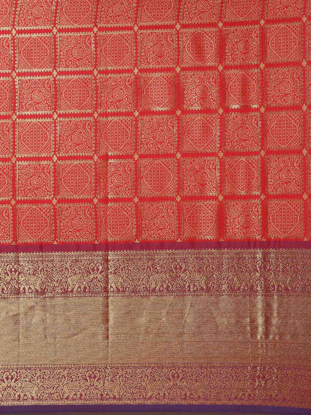 Detailed view of red checked print on Kanjivaram saree