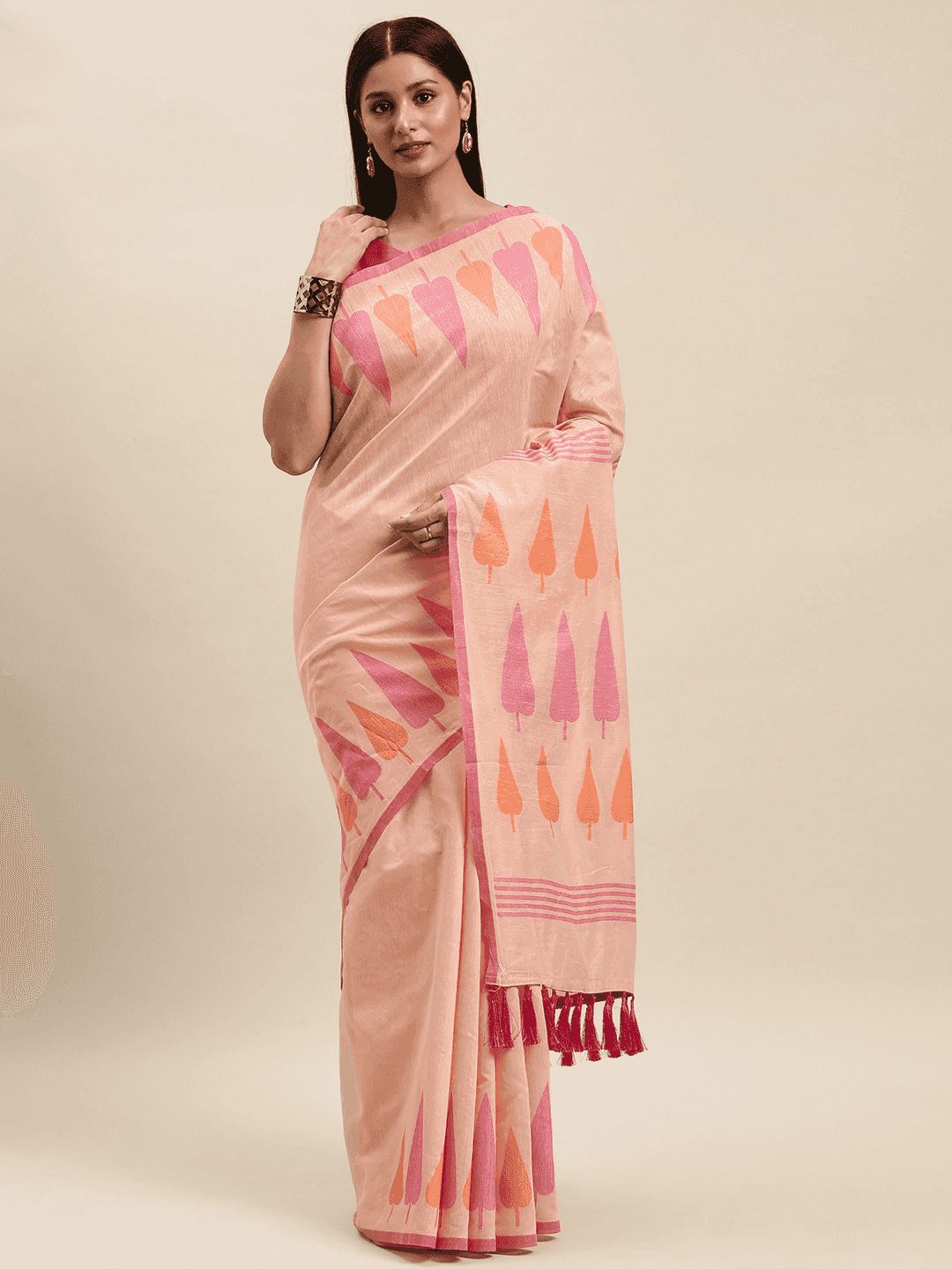 Peach cotton silk resham weaving saree, front drape on a model with pink and orange tree motifs
