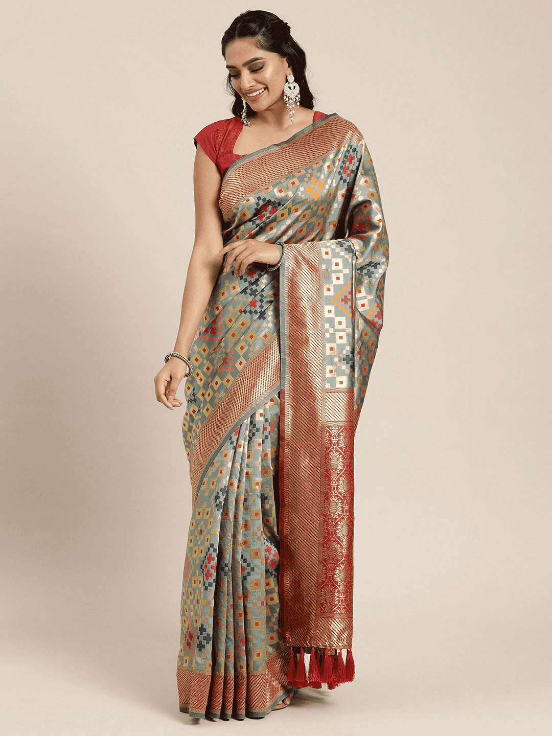 Stylish Patola Silk Saree With Woven Design & Zari Border