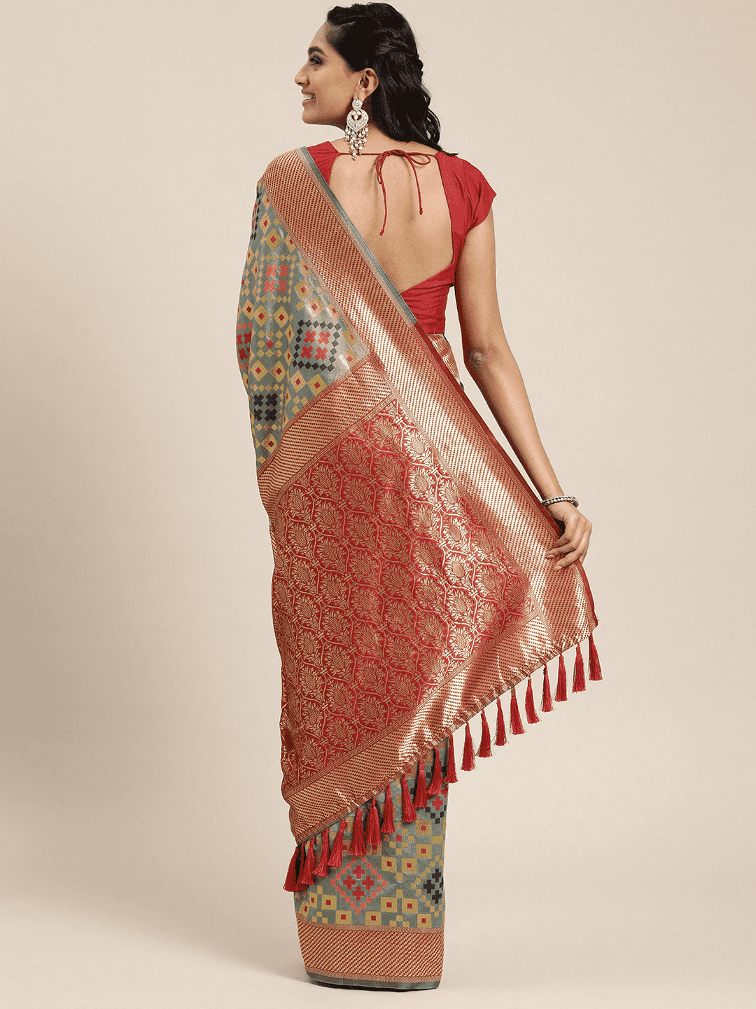 Stylish Patola Silk Saree With Woven Design & Zari Border