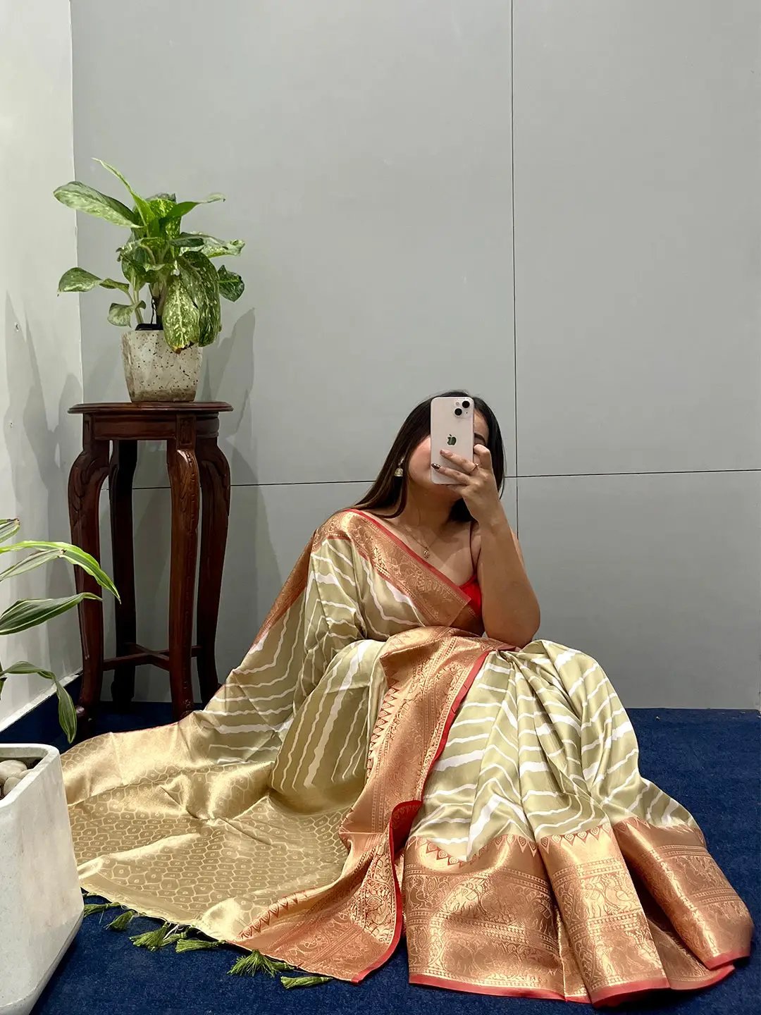 Model sitting with Exclusive Kanchi Zari Border Saree