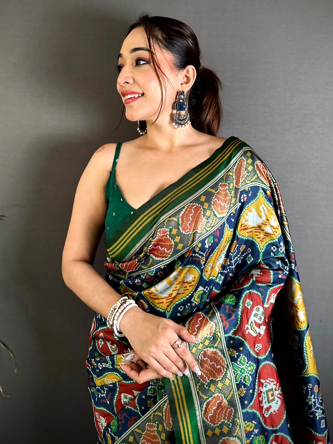 Elegant Dark Tone Ikkat Patola Silk Saree