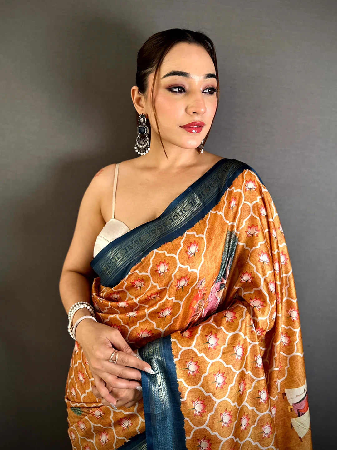 Elegant Ochre Soft Silk Pichwai Print Saree