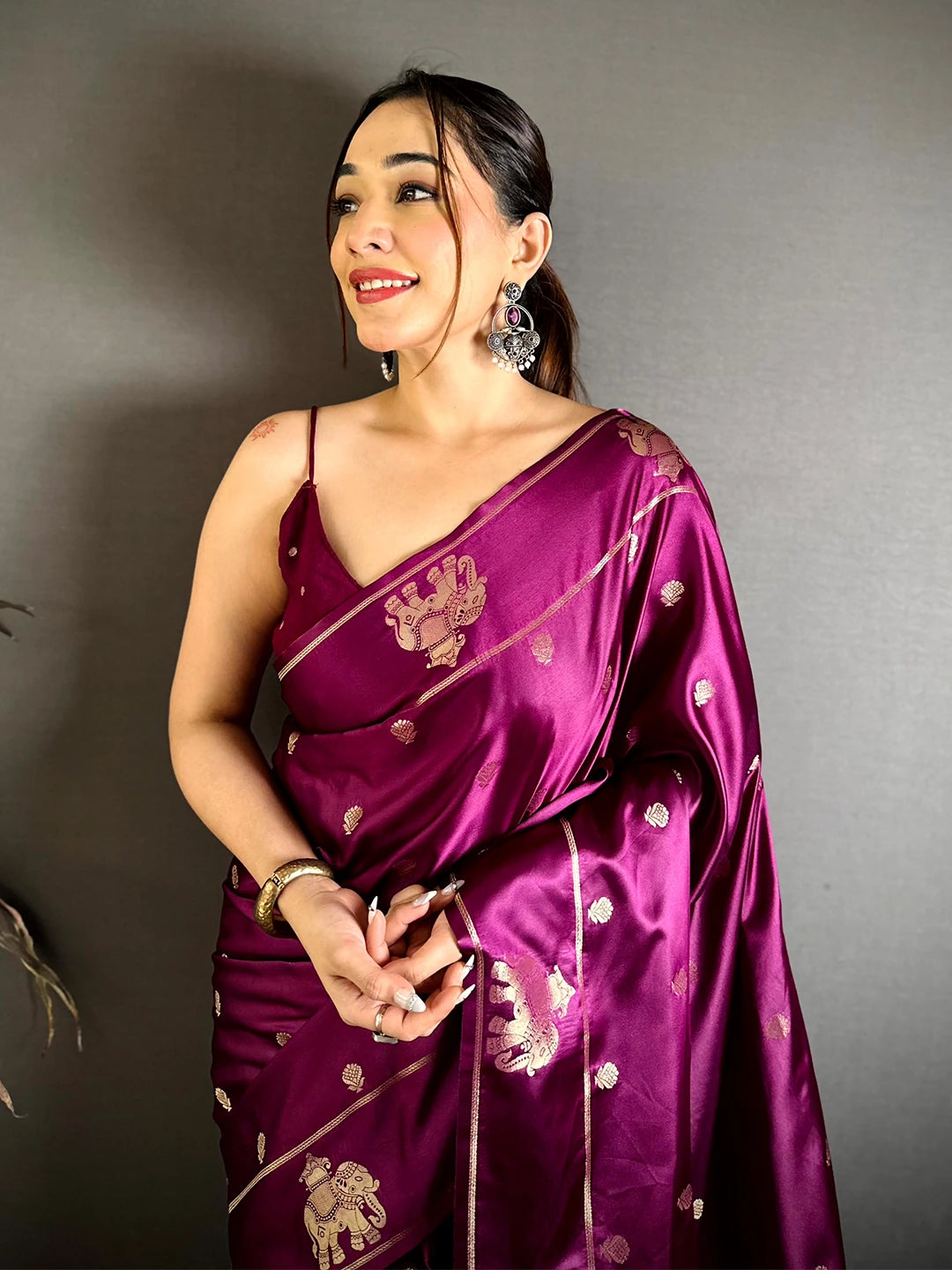 Wine Mashru Satin Silk Elephant Zari Butta Saree, close-up of the drape over the blouse and zari butta on the body