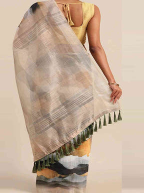 Back view of beige linen saree with tassels