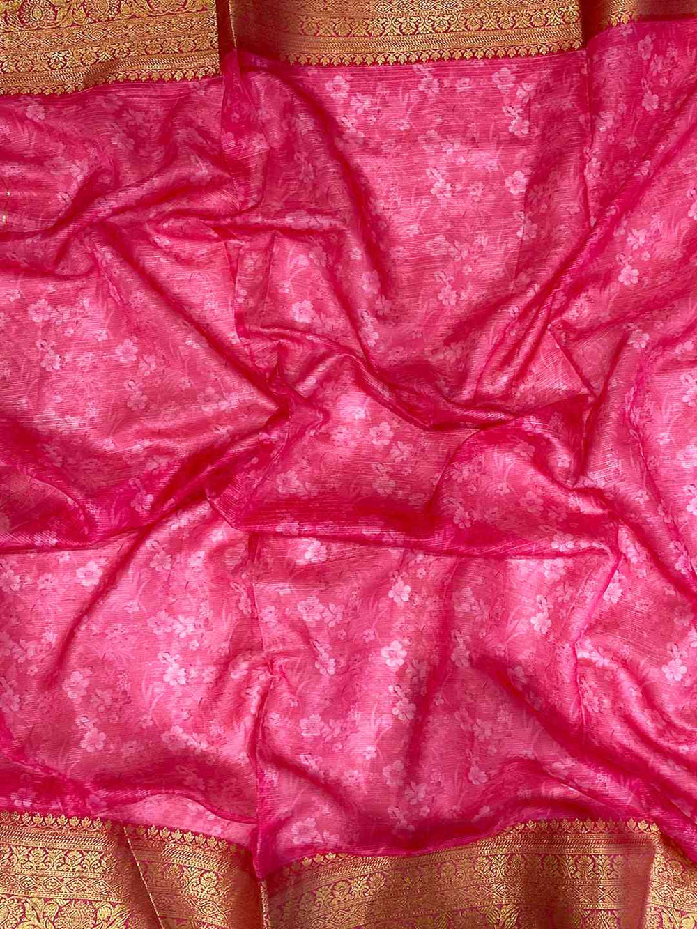 Vibrant pink and gold border of Kota silk saree