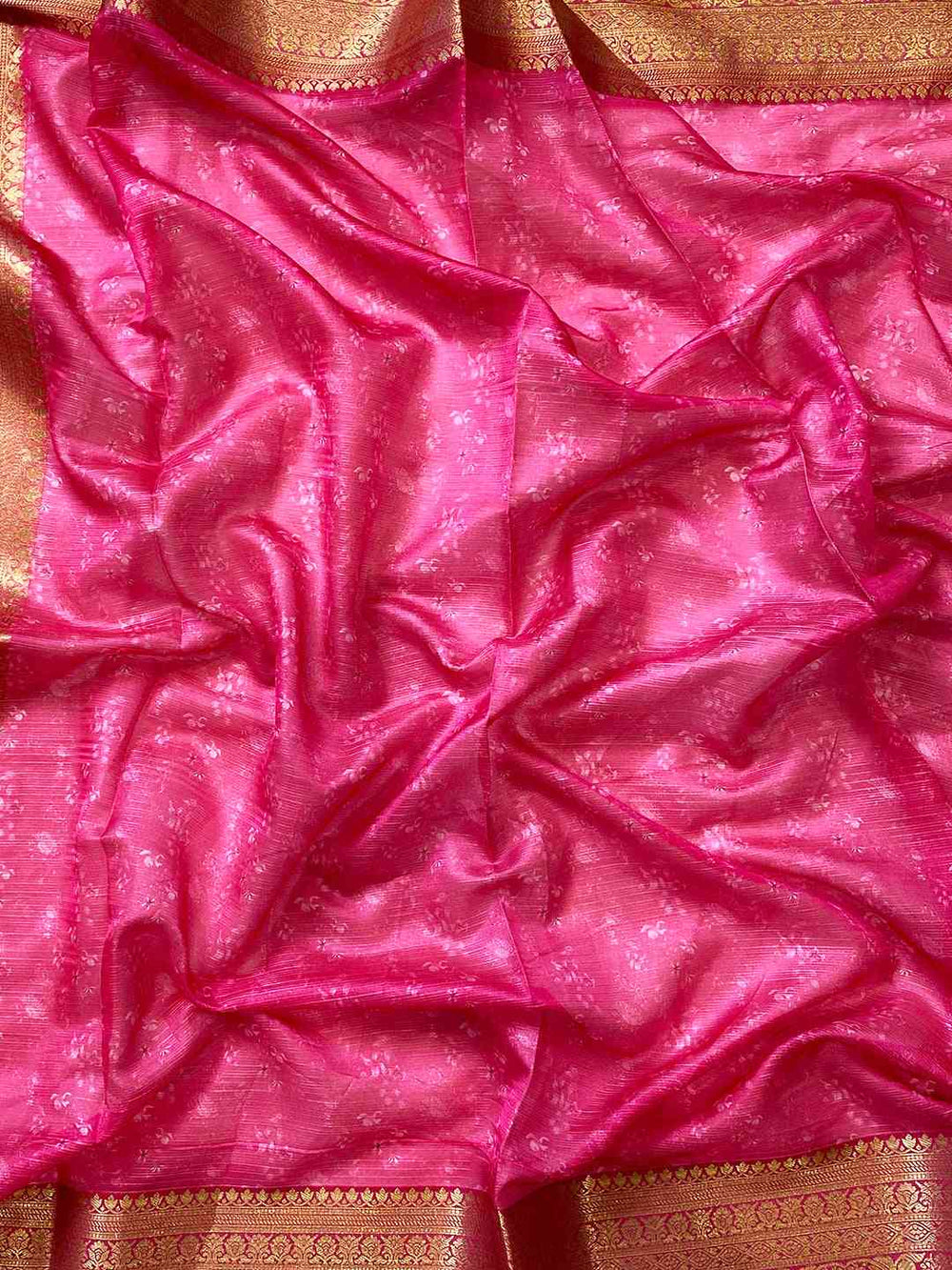 Close-up of pink and gold fabric from Kota silk saree