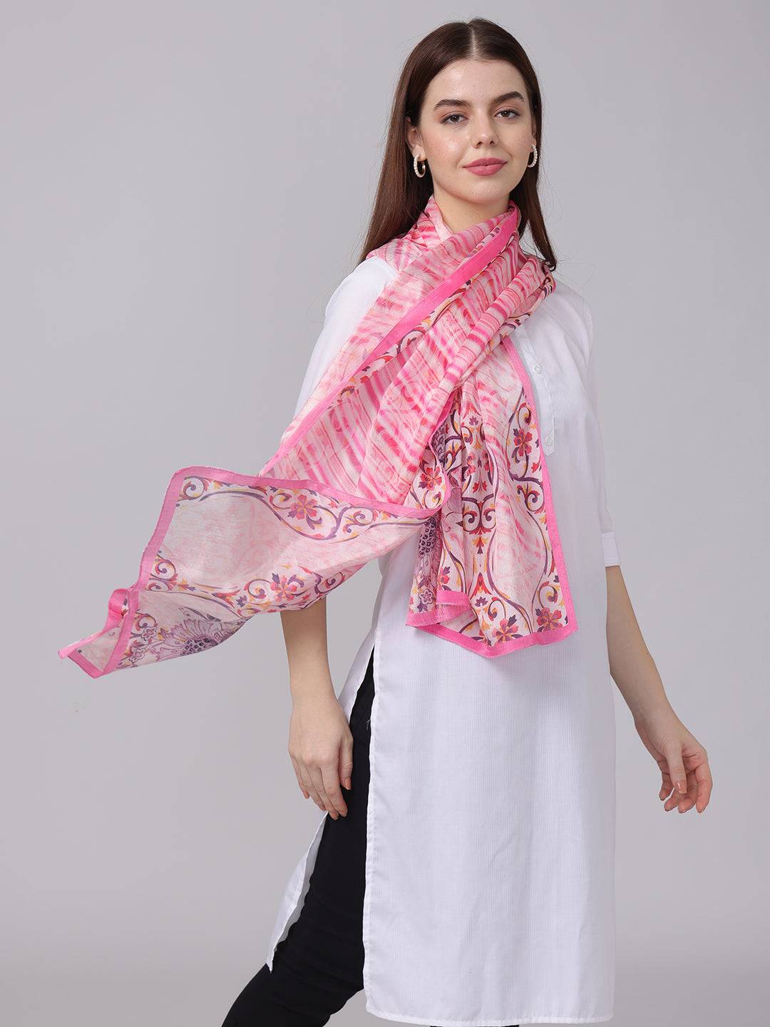 Model showcasing pink Radiant Blossom Stripe Scarf with flair.