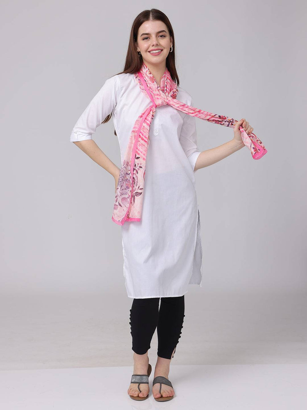Model wearing pink Radiant Blossom Stripe Scarf with floral design.