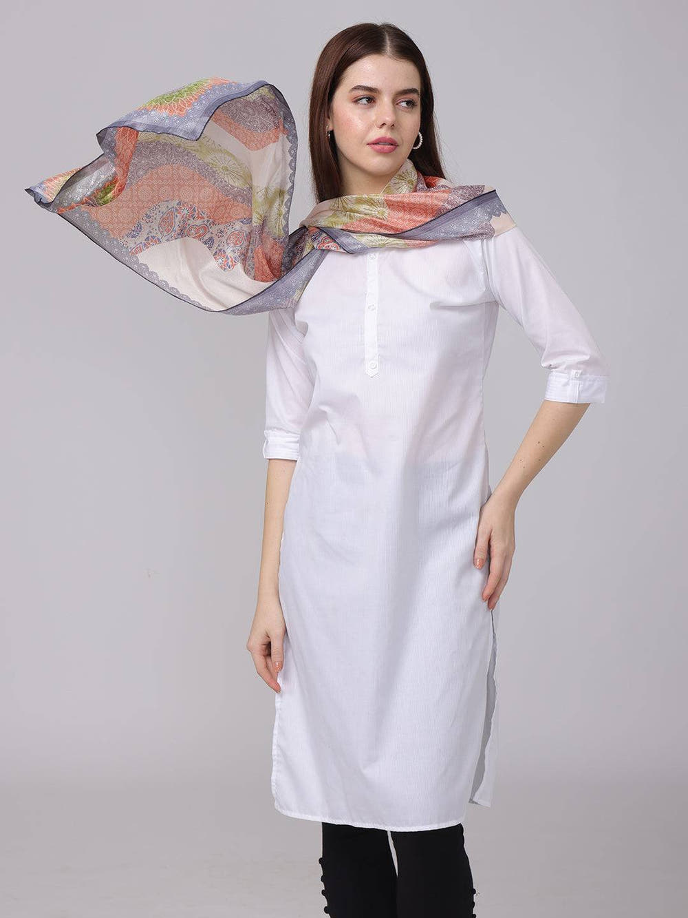 Model showcasing Vibrant Paisley Print Scarf in motion